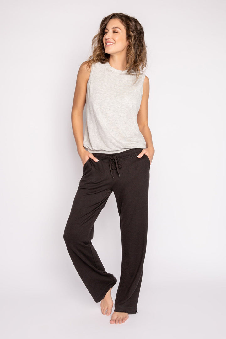 Black mini terry pajama pants with side slit, tie waistband, and pockets. (7122608324708)