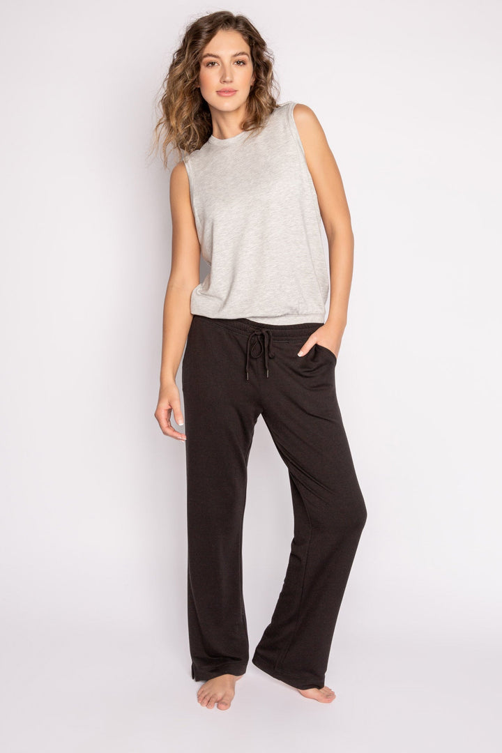 Black mini terry pajama pants with side slit, tie waistband, and pockets. (7122608324708)