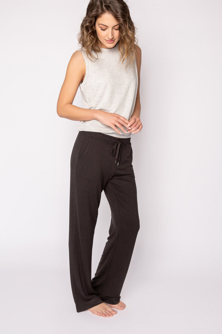 Black mini terry pajama pants with side slit, tie waistband, and pockets. (7122608324708)
