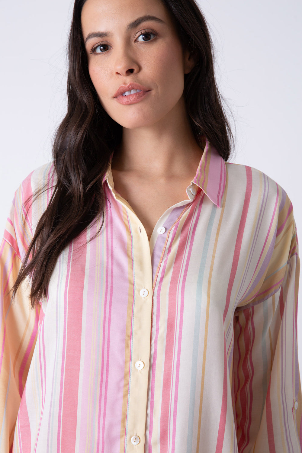 Women's striped button down shirt in pink-peach-natural. Collar & roll-up tab sleeve.