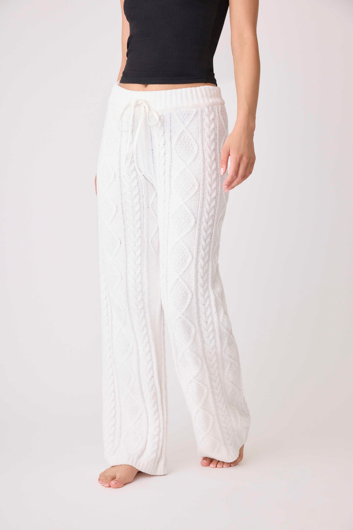 Women's cable texture sweater pant in ivory knit. Rib waistband, straight leg fit.