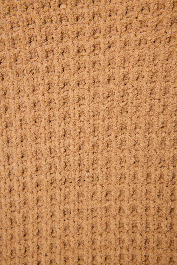 Close-up of the P.J. Salvage Chenille Waffle Solid Caramel Banded Pant, highlighting its soft, plush chenille fabric with a beige waffle grid pattern featuring evenly spaced raised lines for added texture.