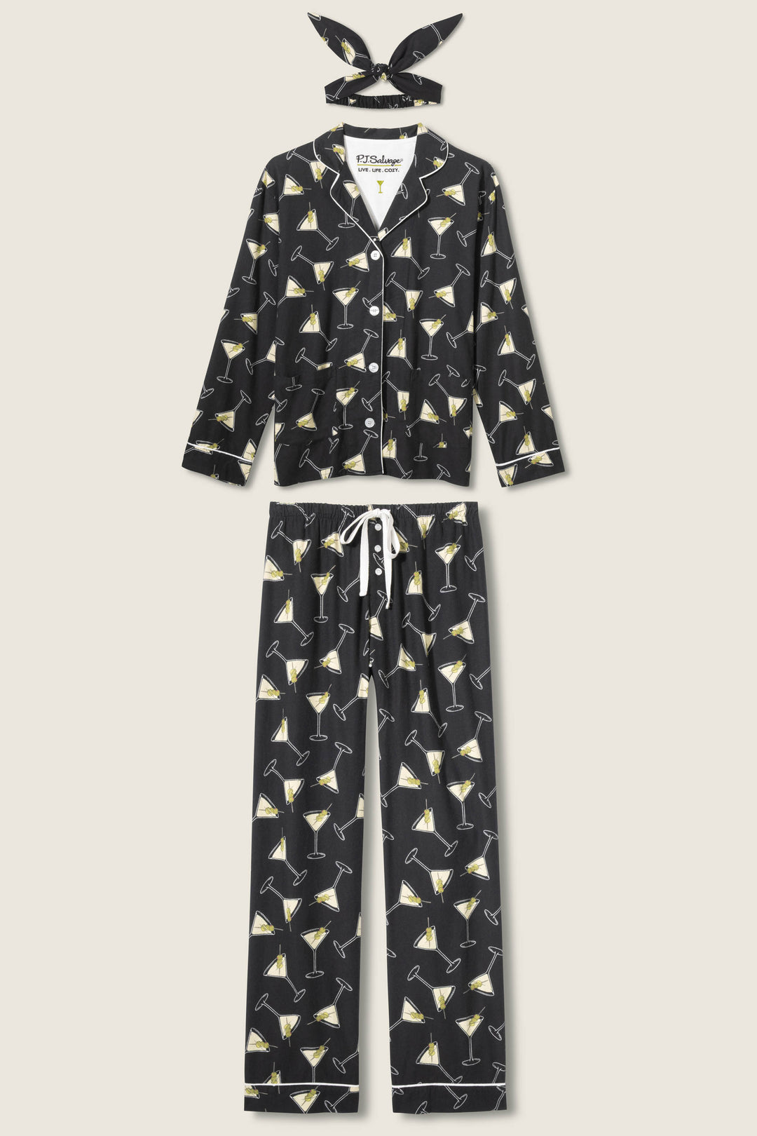 The P.J. Salvage Merrier With A Martini Flannel PJ Set includes a button-up long sleeve shirt, drawstring pants, and a headband—each black with a yellow-accented martini glass print.