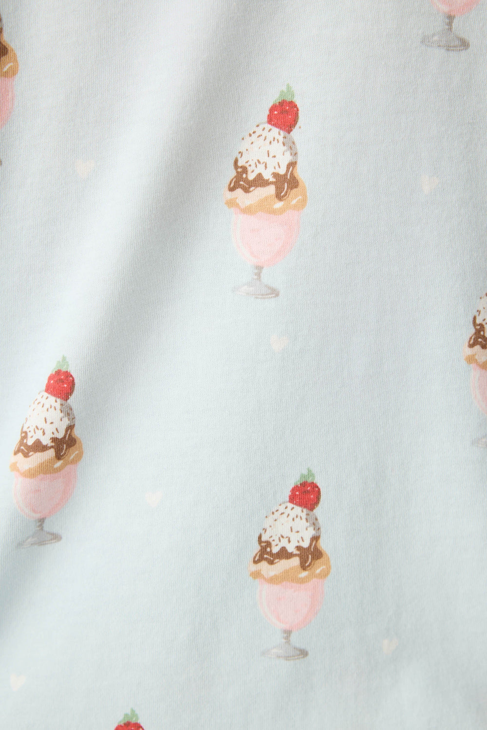 Women's light blue ice cream printed pajama set tank top & tie-waist pajama pant.