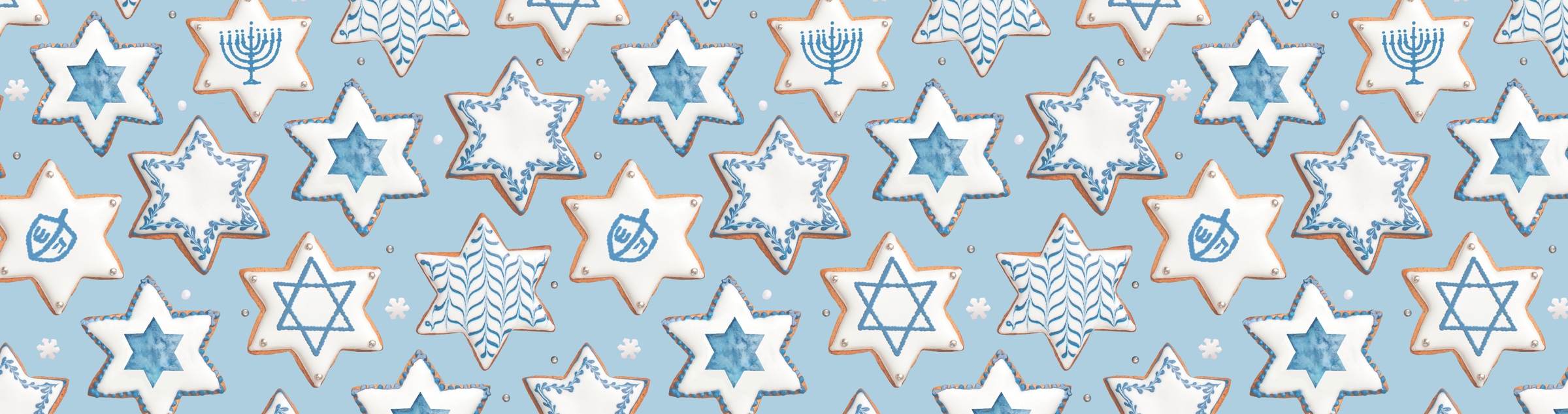 A woman in blue Hanukkah-themed pajamas poses against a blue background. She holds green apples in various ways: biting one, balancing a tray on her head, and holding one near her face while smiling.