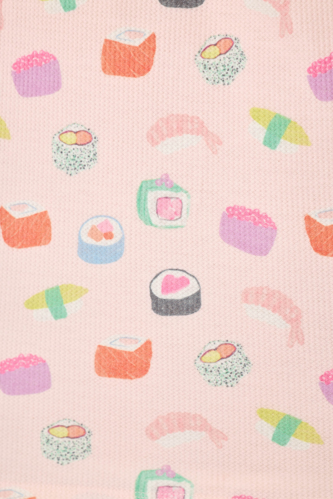 The fabric shows a playful, cartoon-style seamless pattern of colorful sushi rolls and nigiri on a light pink textured background.
