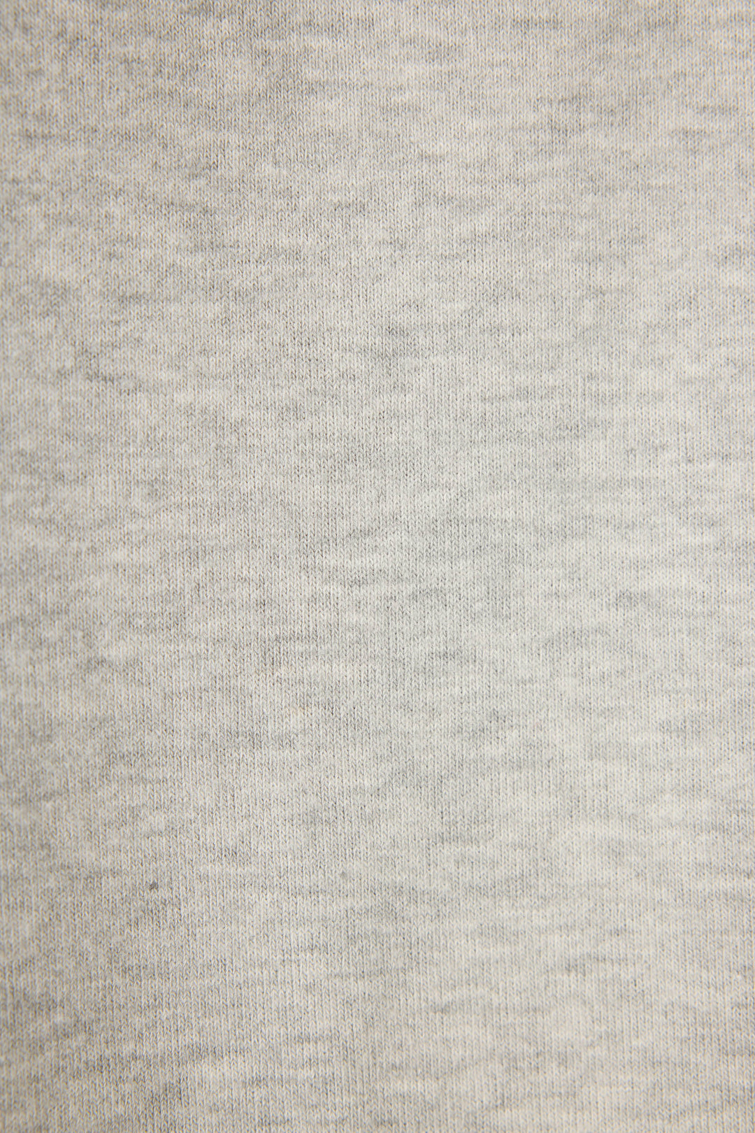 Close-up of the C'est La Vie Heather Grey Hoodie by P.J. Salvage, featuring light gray fabric with a soft, evenly woven heathered texture and subtle tone variations across the surface.