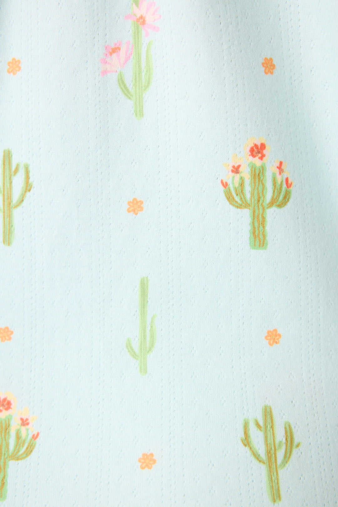 The Feelin' Prickly Cactus Blooms 3-Piece Short PJ Set by P.J. Salvage features light blue fabric with green cacti, pink flowers, and scattered orange blooms for a fun, cozy sleepwear look.