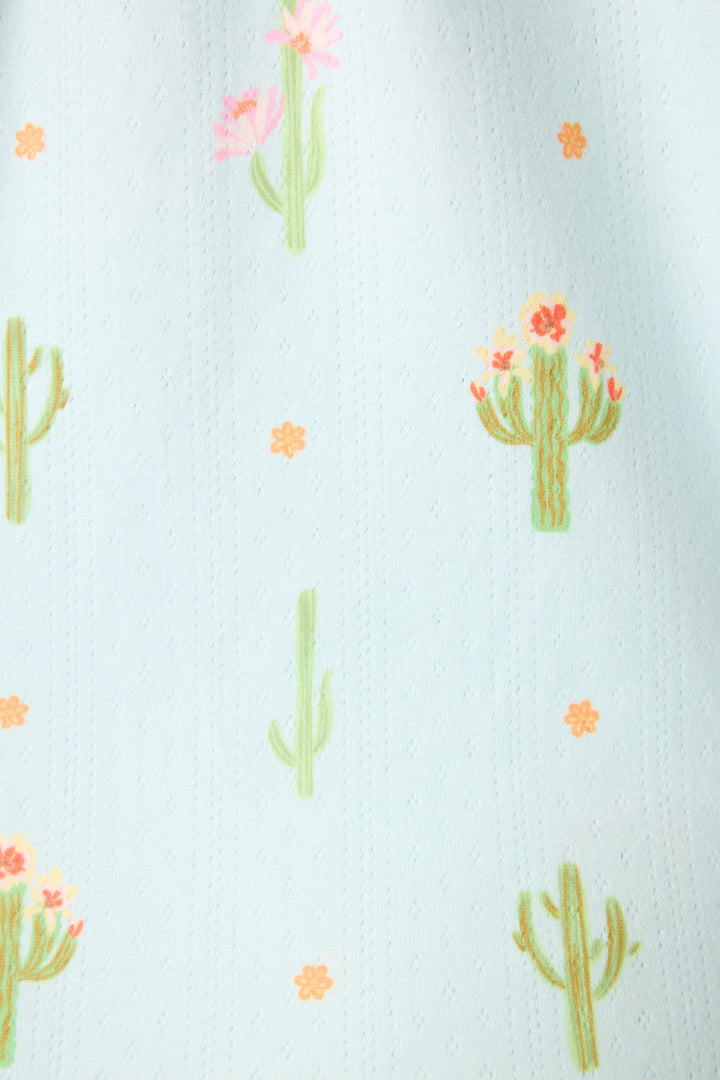The Feelin' Prickly Cactus Blooms 3-Piece Short PJ Set by P.J. Salvage features light blue fabric with green cacti, pink flowers, and scattered orange blooms for a fun, cozy sleepwear look.