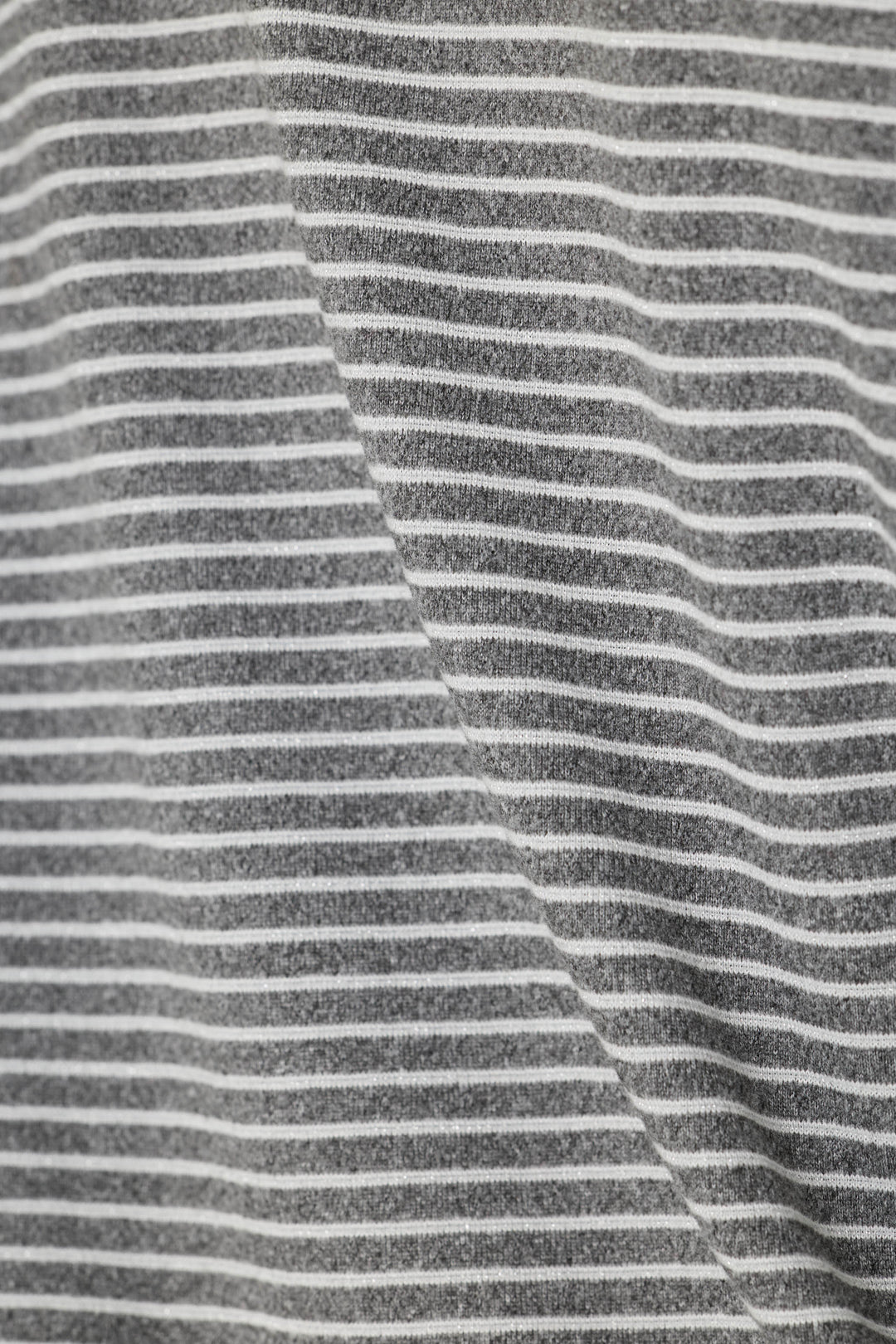 Close-up of a gray and white horizontally striped fabric texture.
