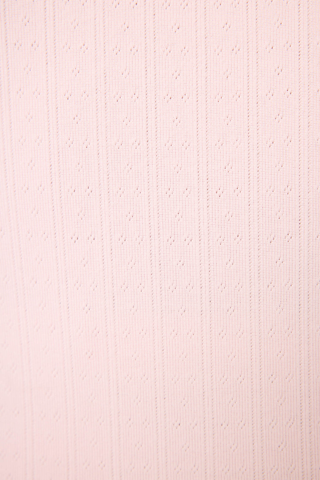 Close-up of Luxe Leopard Dreams Ballet Pink Shorts by P.J. Salvage, featuring pale pink ribbed fabric with subtle dotted perforations—ideal for breathable, feminine sleepwear or loungewear.