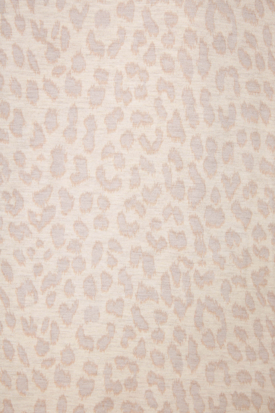 A close-up of the Luxe Leopard Dreams Tank Top by P.J. Salvage shows soft jersey fabric with a cozy beige and light brown leopard print, perfect for sleepwear or lounging in style.