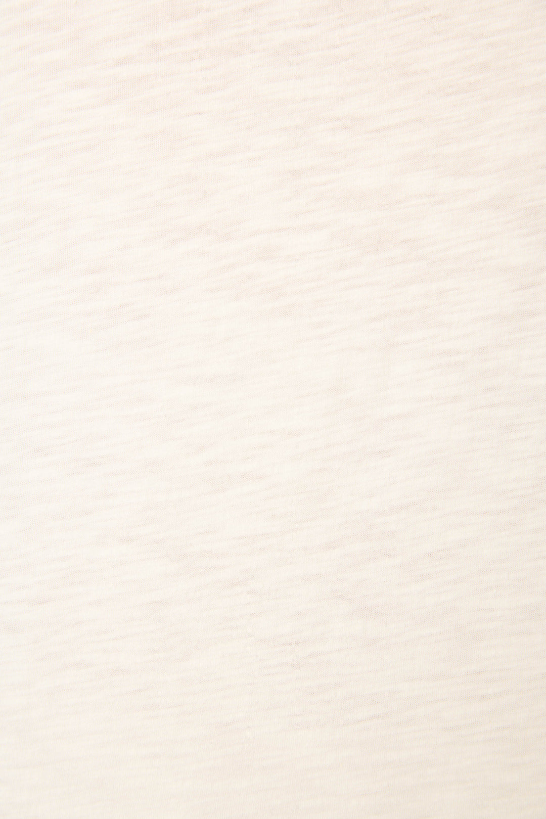 Soft light beige fabric with a subtle horizontal textured pattern and an evenly lit surface.