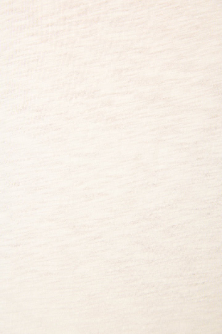 Soft light beige fabric with a subtle horizontal textured pattern and an evenly lit surface.