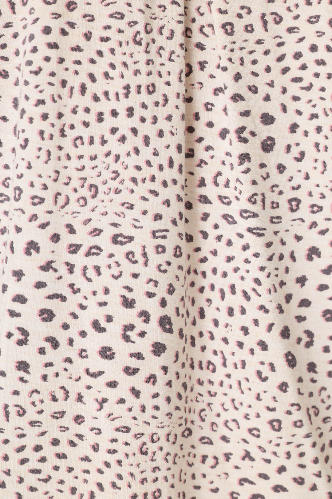 Close-up of the Modal Dreams Leopard Print 3-Piece PJ Set by P.J. Salvage, featuring soft light beige modal jersey fabric with small, irregular black and dark brown leopard spots for a stylish, cozy animal-print look.