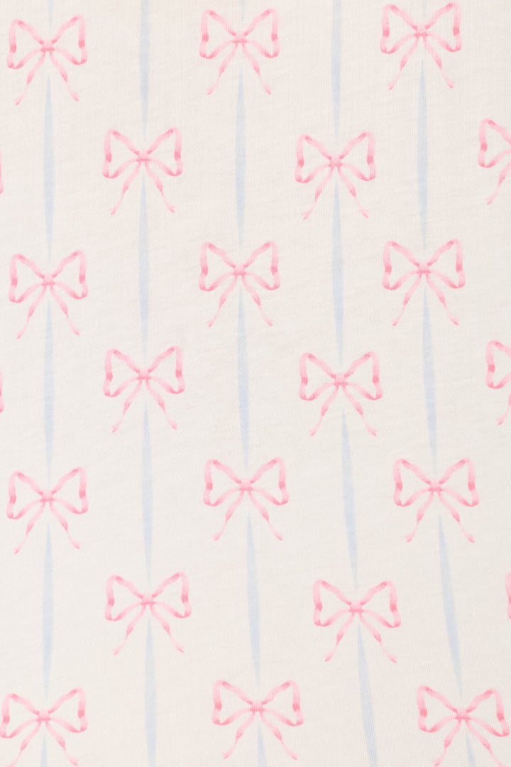 The Playful Prints All Wrapped Up Long PJ Set by P.J. Salvage features evenly spaced pink bows and light blue stripes on an off-white background, adding charming detail to women's sleepwear.