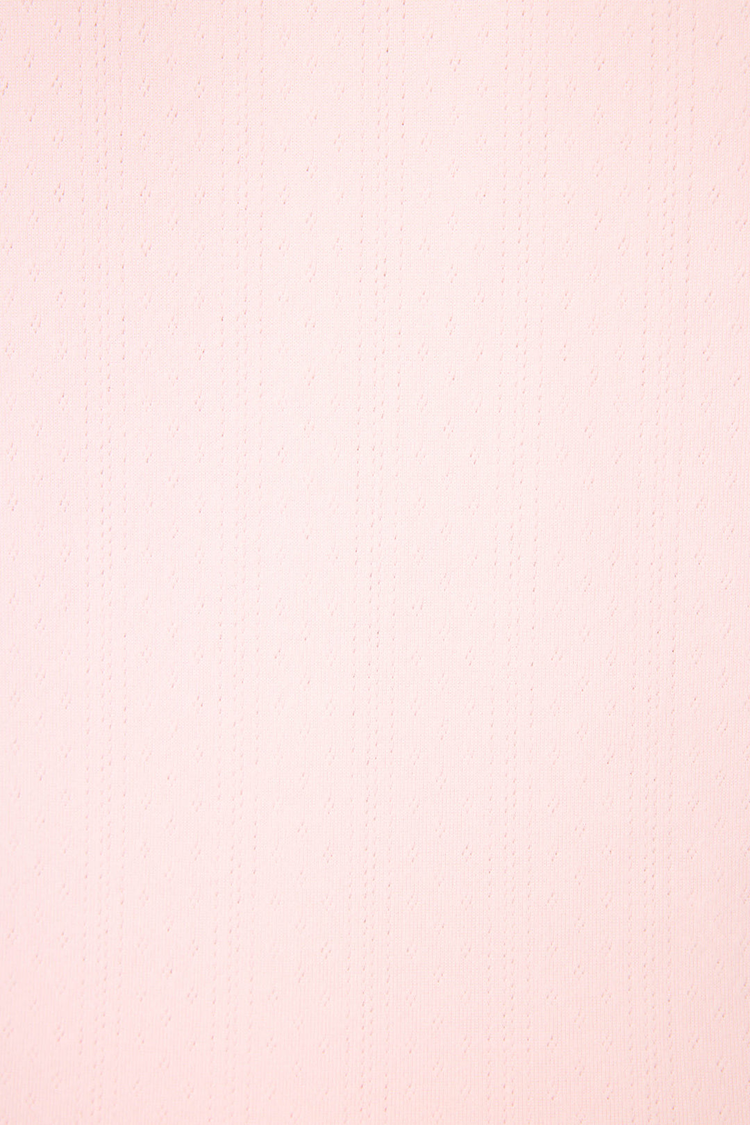 The Pointelle Essentials Ballet Pink Cardigan by P.J. Salvage features a light pink, textured surface with subtle vertical dotted lines and a faint diamond pattern, creating a consistent and elegant look throughout.