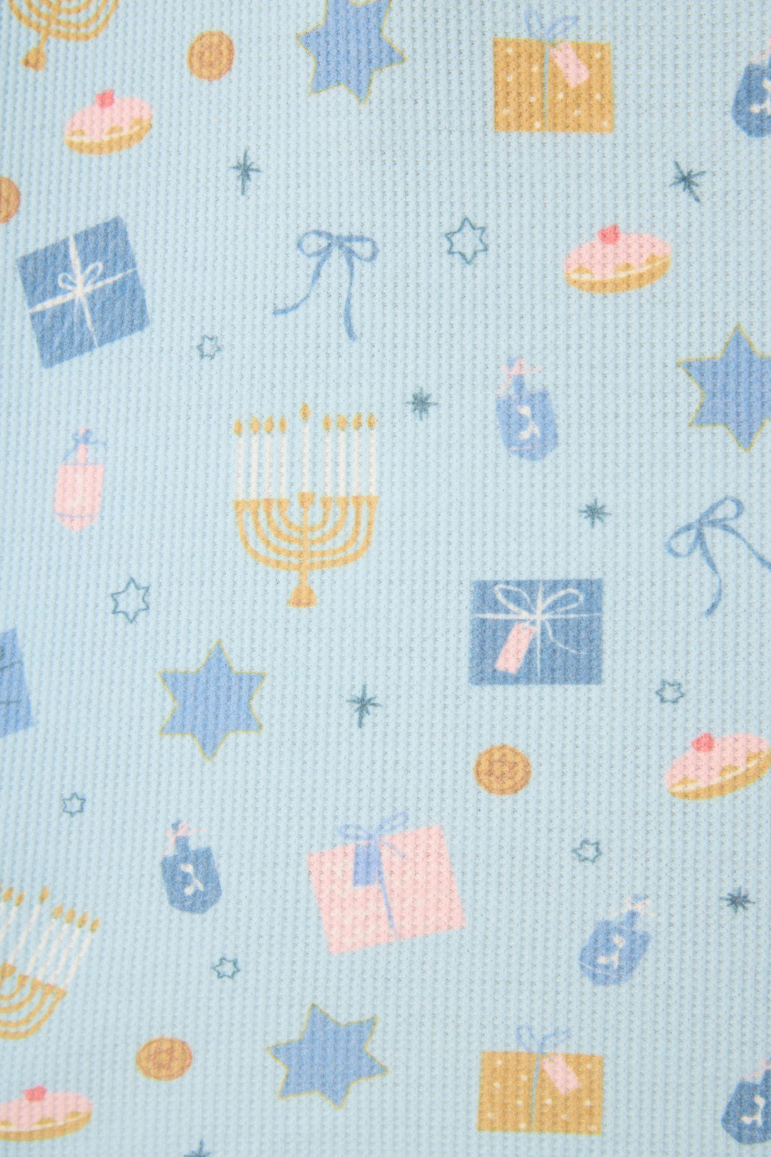 The P.J. Salvage STARS PJ SET BOYFRIEND BOXER SHORT GIFT SETS features light blue fabric with menorahs, dreidels, Stars of David, gift boxes, doughnuts, and gold coins in pastel blue, pink, and yellow.