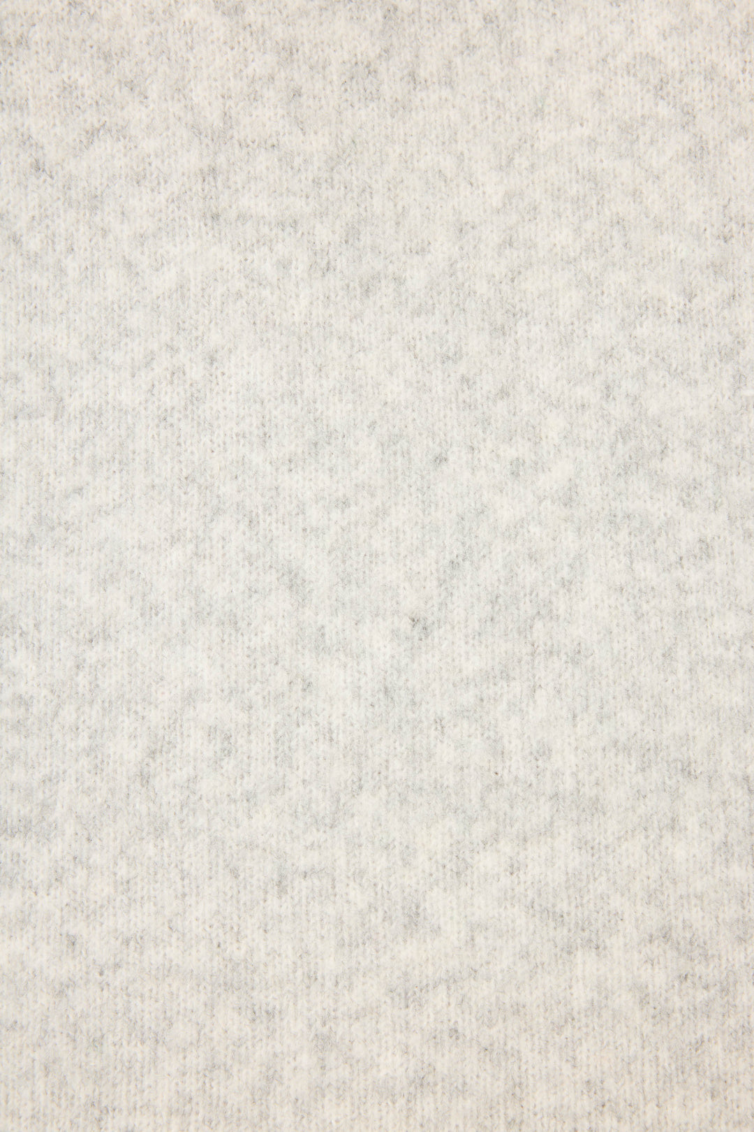 Close-up of the Pretty Punch Happy Hour Snuggle Sweater by P.J. Salvage, showing its light gray, soft-textured fabric with a subtle, even pattern for a cozy, uniform look.