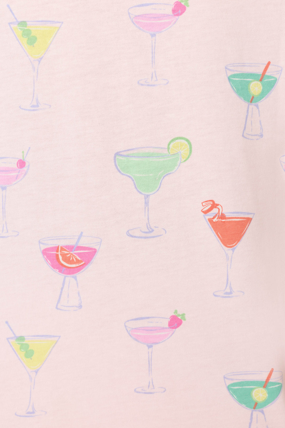 The Whimsy Sip Happens Cropped PJ Set by P.J. Salvage features a playful pattern of colorful cocktail glasses with various drinks and garnishes on a light pink background.