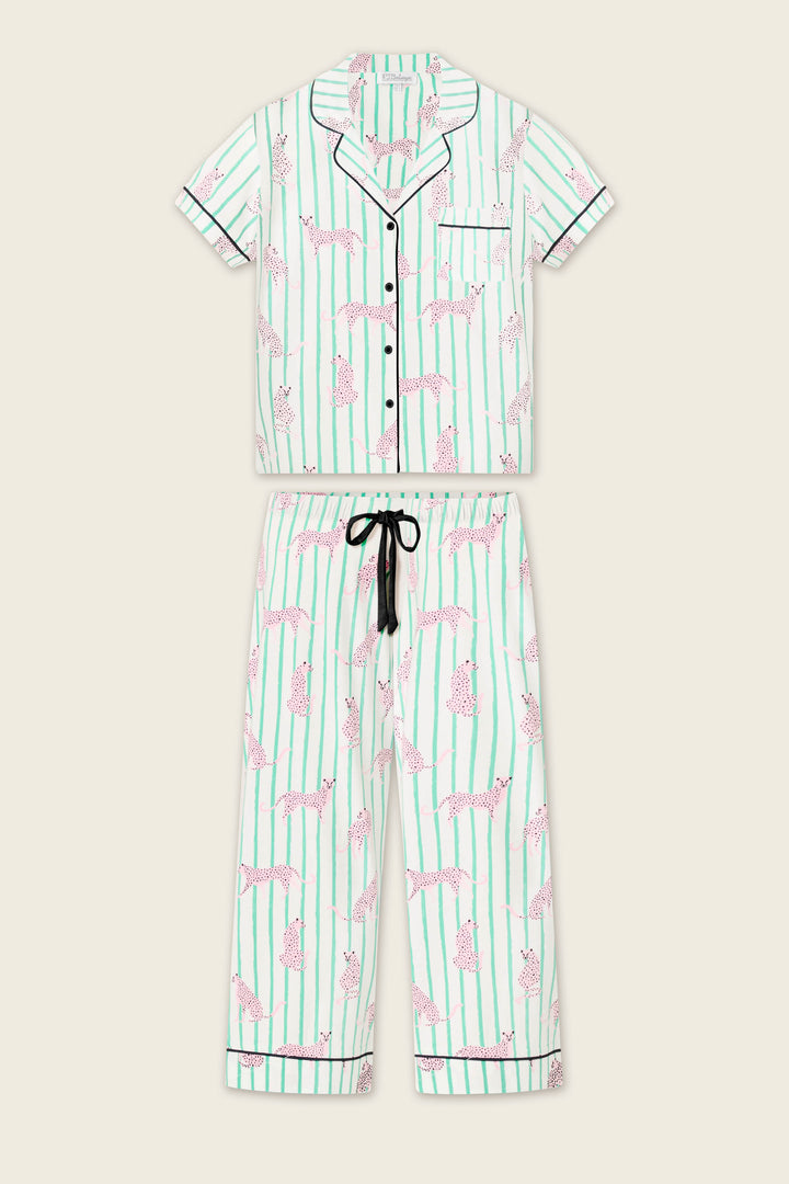 The Whimsy Cool Cat Cropped PJ Set by P.J. Salvage features a short-sleeve button-up top and long pants in white with light green stripes and pink cheetah print, plus a black drawstring waist.
