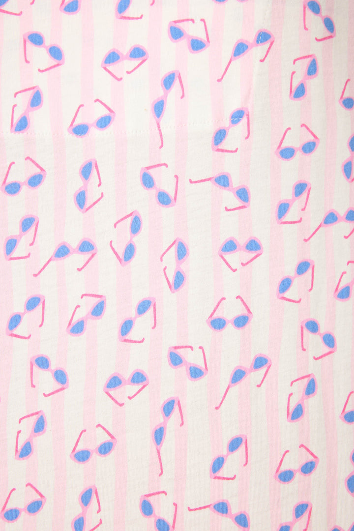 The Whimsy Retro Shades Short PJ Set by P.J. Salvage features an evenly spaced pattern of blue and pink sunglasses in various directions on a light pink and white striped background.