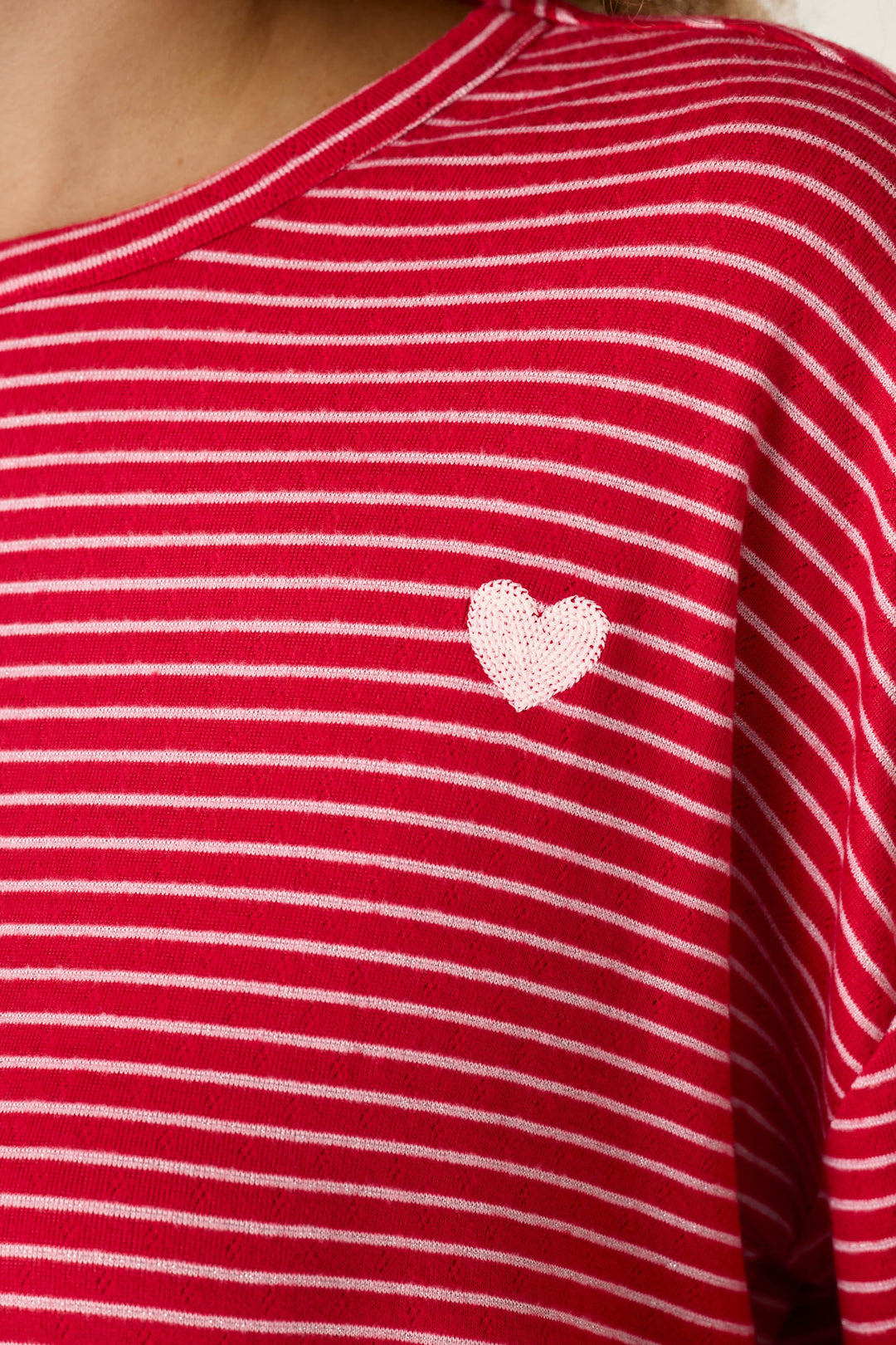 Icon Stripes Red Long Sleeve PJ Set featuring a red long-sleeved brushed pointelle pajama shirt with thin white horizontal stripes and a small white heart on the chest.