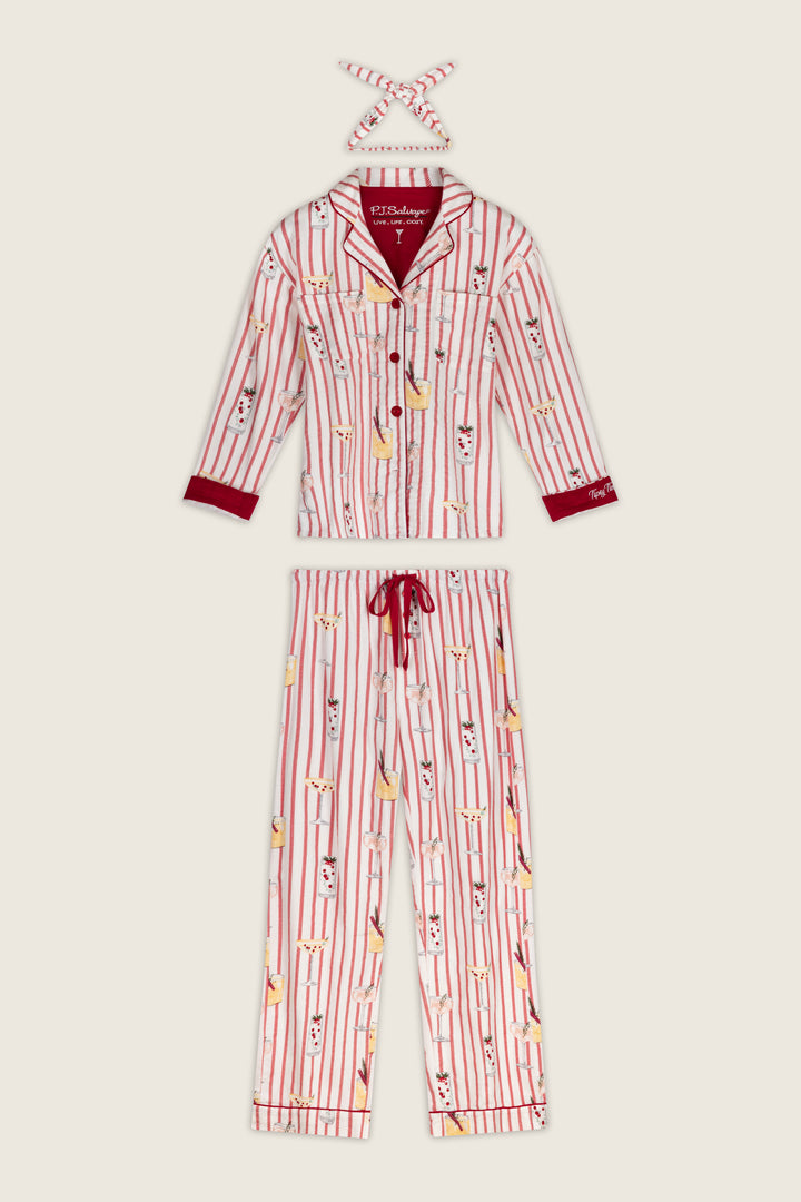 P.J. Salvage Martinis & Mistletoe Cocktail Print Flannel 3-Piece PJ Set featuring a long-sleeve button-down top, matching drawstring pants, and a headband, all in a red striped pattern with illustrated holiday cocktails.