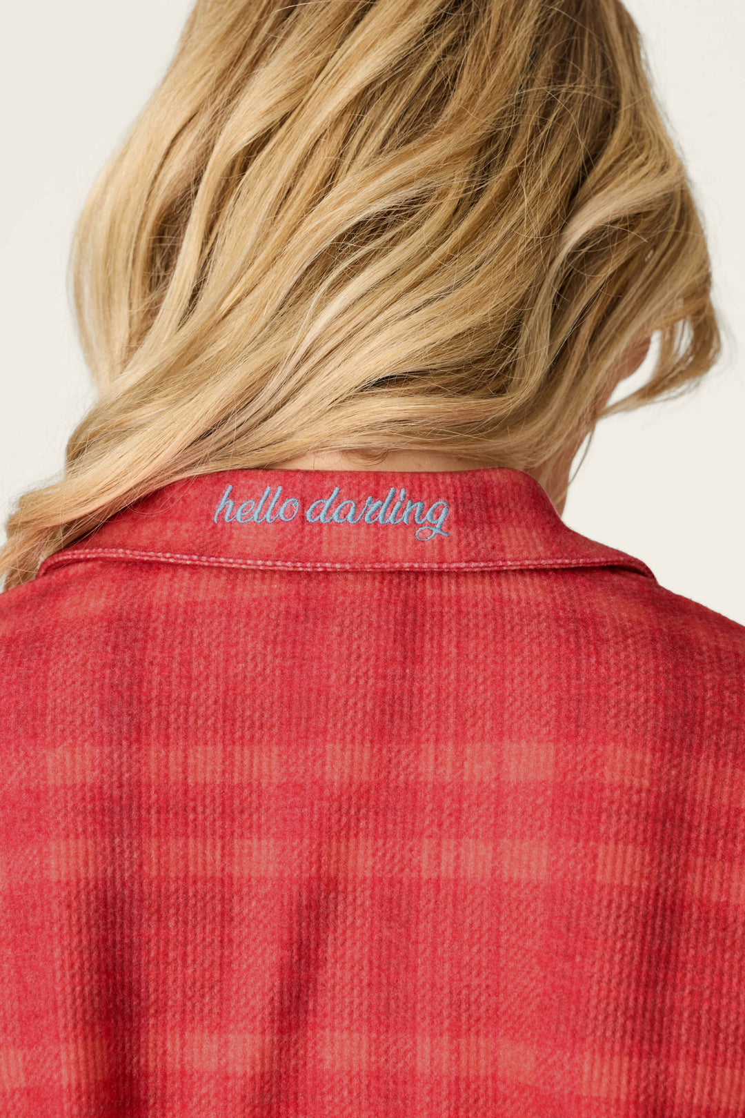 Red plaid Mad for Plaid Long Sleeve & Pants PJ Set shirt with long sleeves and the words hello darling embroidered in blue cursive on the back of the collar.