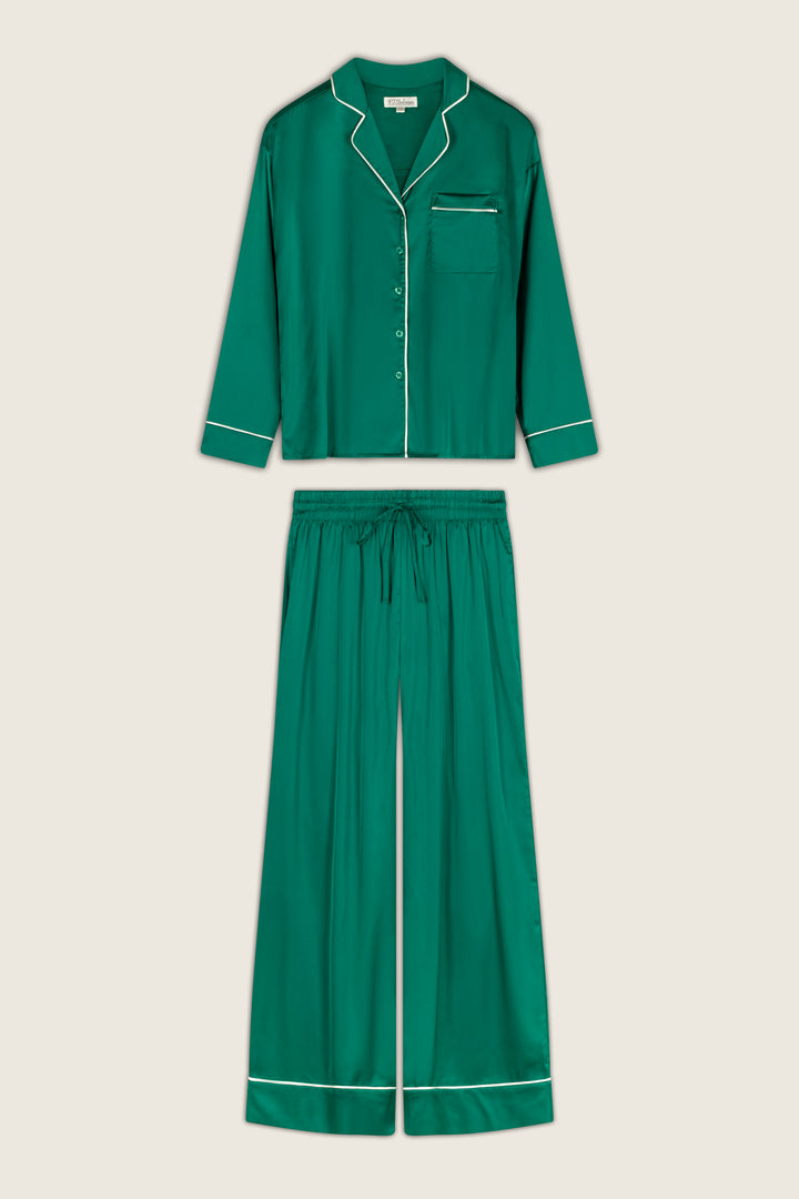 P.J. Salvage Moonlight Muse Green Satin Long Sleeve PJ Set featuring an emerald green long-sleeve button-up top and matching wide-leg trousers with white piping trim.
