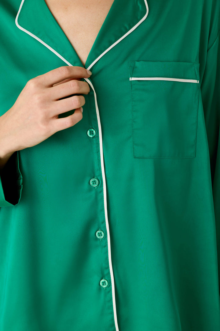 Moonlight Muse Green Satin Long Sleeve PJ Set button-down top in a luxe satin finish, detailed with white piping and a chest pocket.
