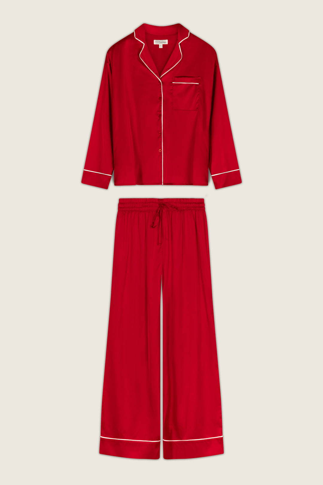 Moonlight Muse Red Satin Long Sleeve PJ Set consisting of a red long-sleeve button-down collared top and matching wide-leg trousers, both featuring white piping trim for a look of luxe loungewear.