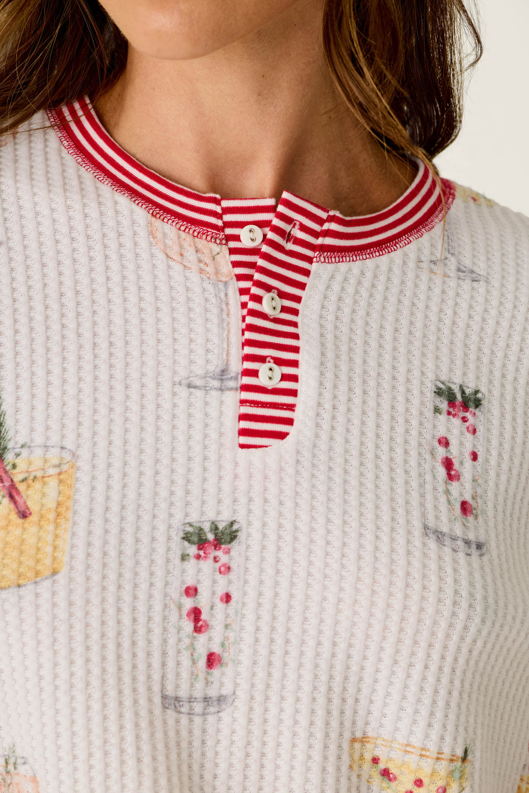 P.J. Salvage Ski Jammie Classics Cocktail Print Long Sleeve PJ top in a cozy waffle-knit with a button-up henley neckline featuring red and white stripes.