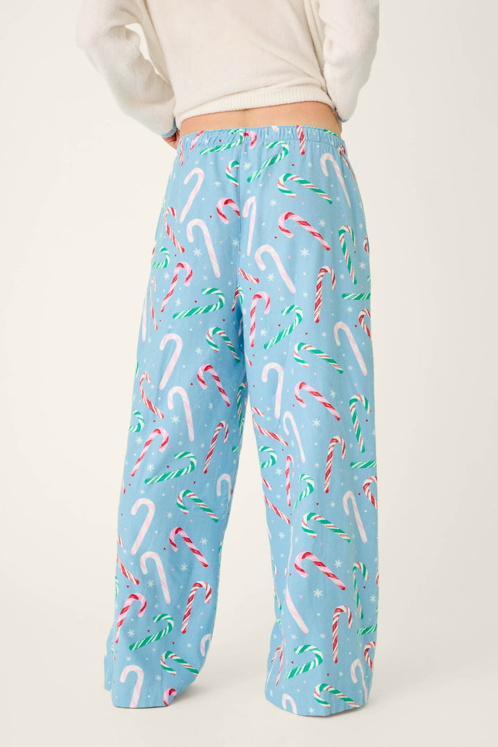 P.J. Salvage The Sweetest Season Candy Cane Print Flannel Pajama Pants in light blue with a festive pattern of red, white, and green candy canes and small white snowflakes.