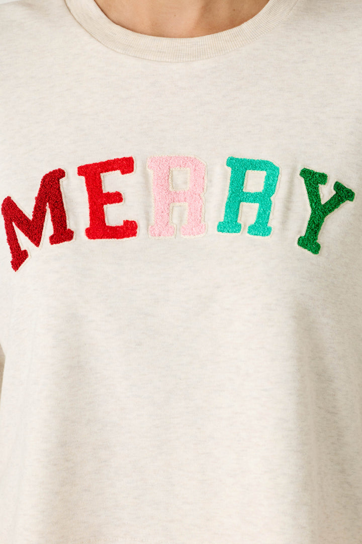 P.J. Salvage Very Merry Bouclé Merry Sweatshirt in cream fleece with MERRY embroidered across the chest in multi-colored, textured letters.