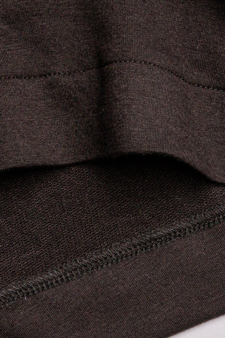 Short sleeve black mini terry button-down pajama shirt with side slit & front pocket. (7122608717924)