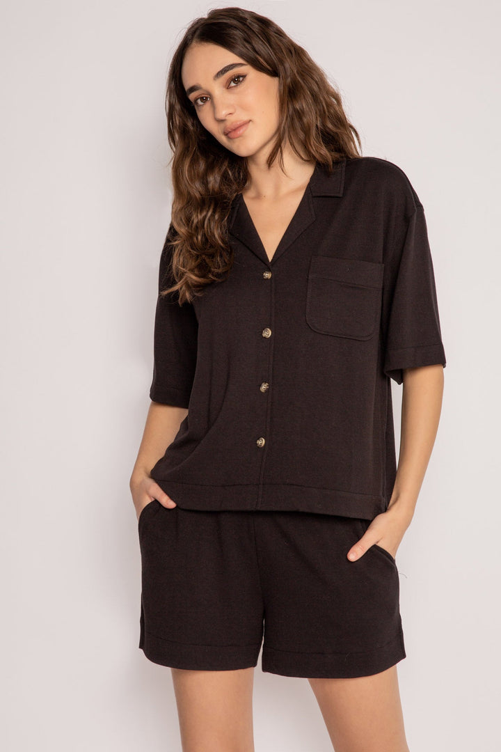 Black pajama set in a short sleeve button top & comfy pocket short in mini French terry. (7199527534692)