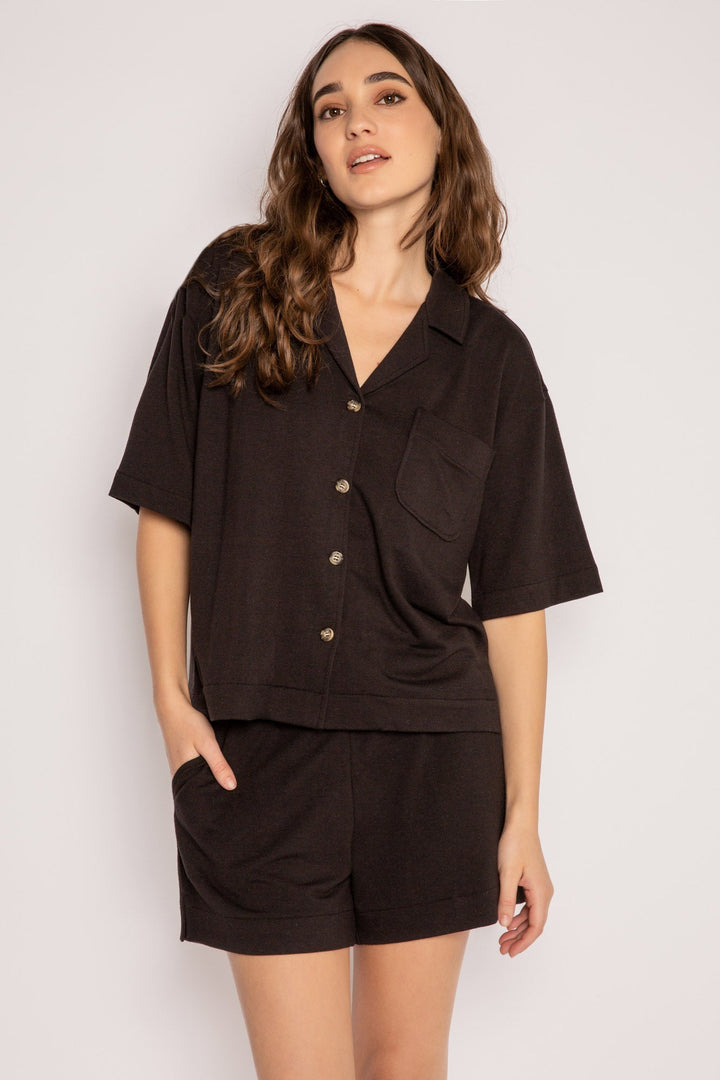 Black pajama set in a short sleeve button top & comfy pocket short in mini French terry. (7199527534692)