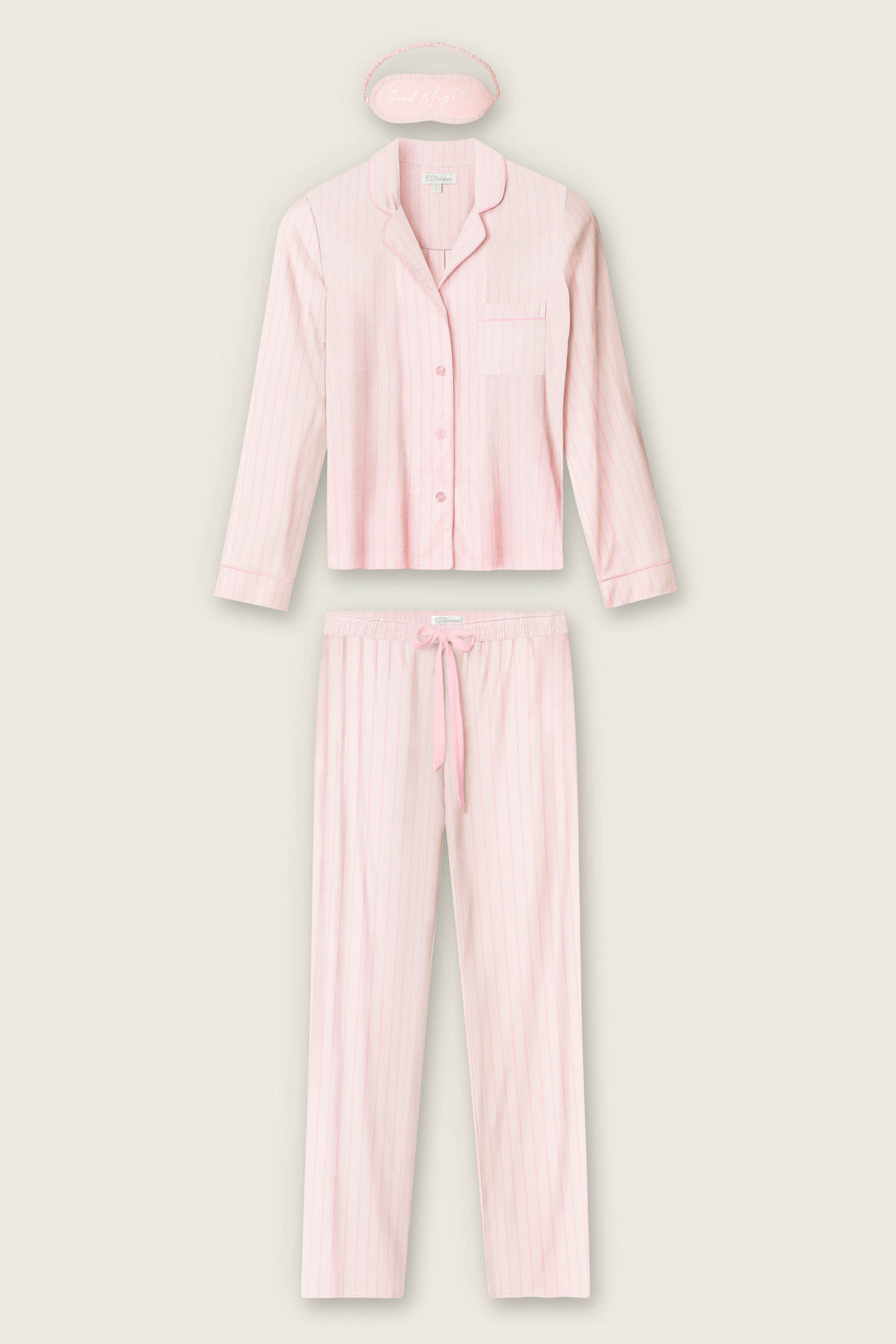 The P.J. Salvage Modal Basics Pink Stripe 3-Piece PJ Set features a light pink striped button-up shirt, drawstring pants, and a matching eye mask, all laid out flat on a plain background.