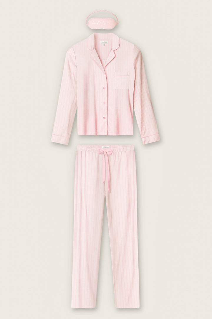 The P.J. Salvage Modal Basics Pink Stripe 3-Piece PJ Set features a light pink striped button-up shirt, drawstring pants, and a matching eye mask, all laid out flat on a plain background.
