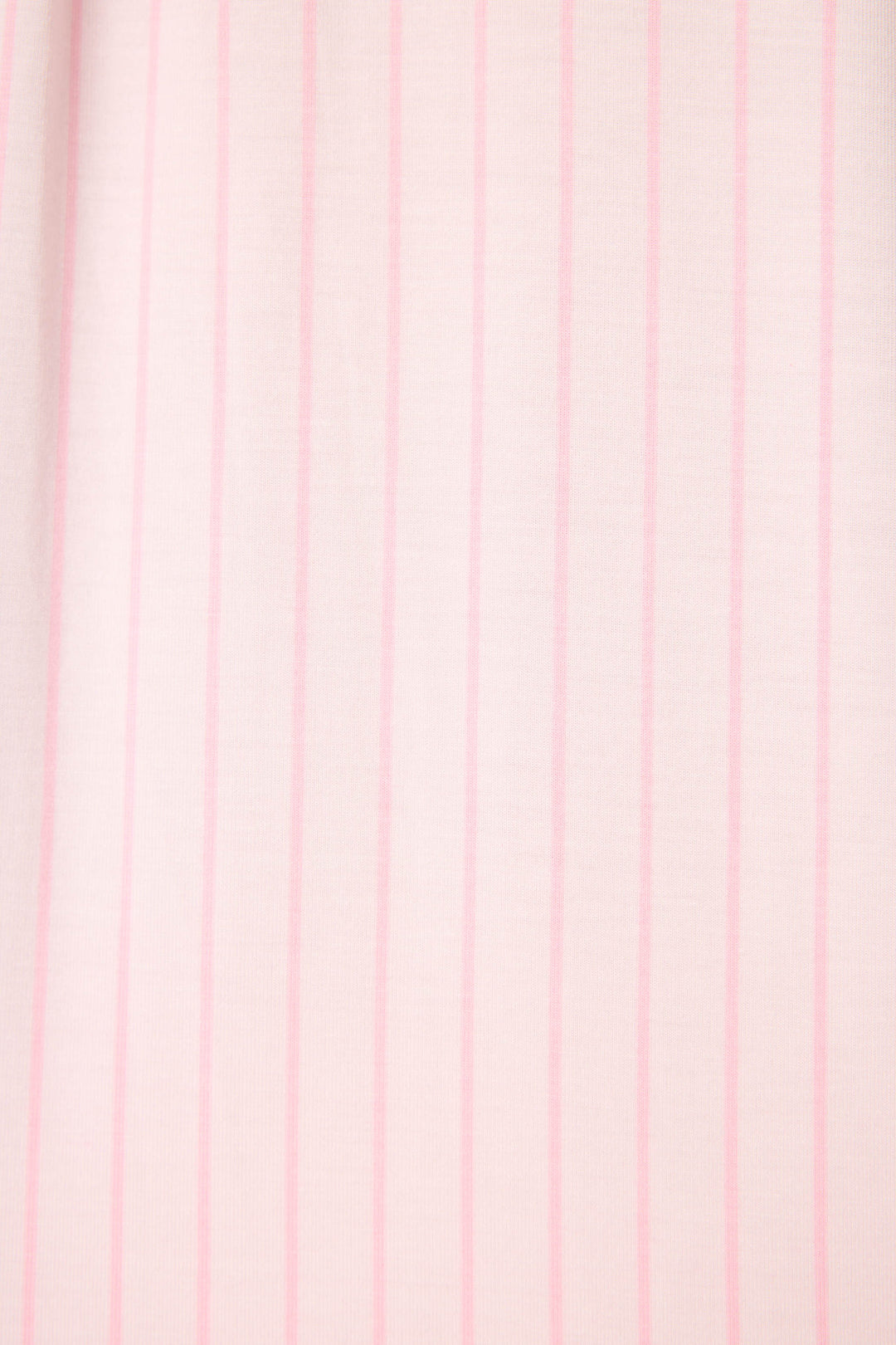 Close-up of the Modal Basics Pink Stripe 3-Piece PJ Set by P.J. Salvage, featuring soft light pink fabric with simple, evenly spaced vertical darker pink stripes for a minimalistic look.