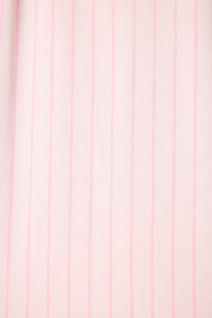 Close-up of the Modal Basics Pink Stripe 3-Piece PJ Set by P.J. Salvage, featuring soft light pink fabric with simple, evenly spaced vertical darker pink stripes for a minimalistic look.