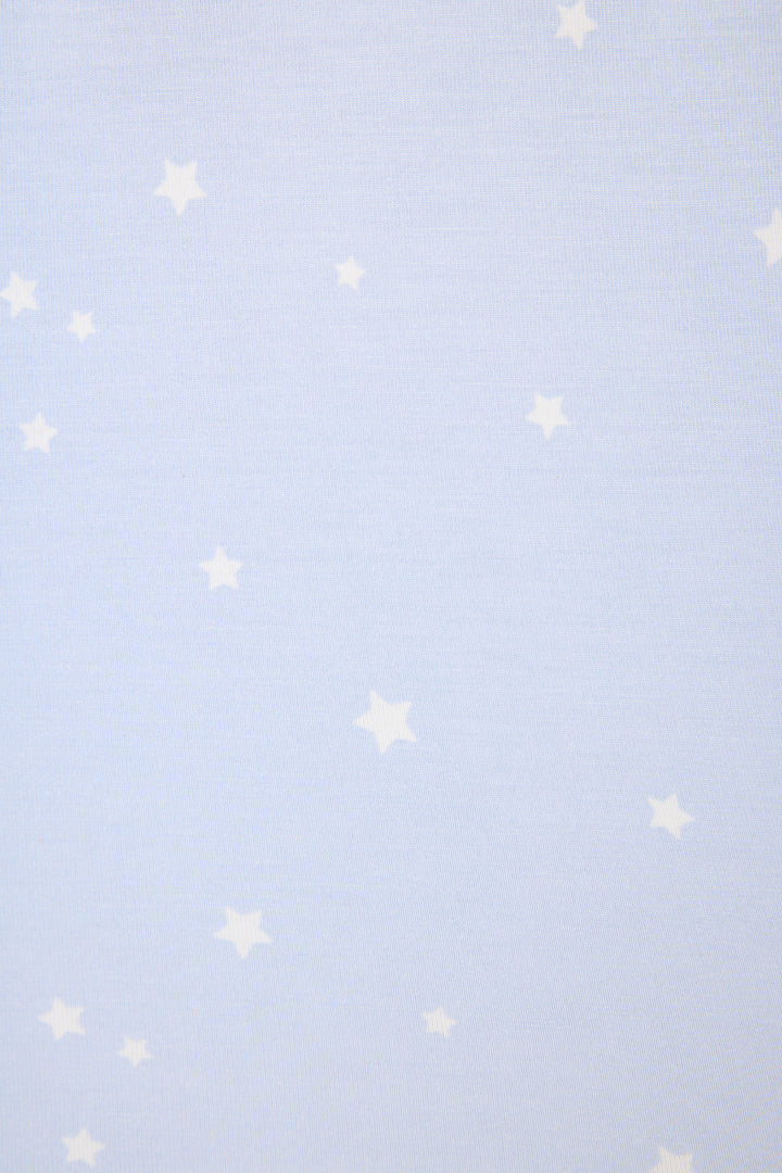 The Modal Basics Star Print 3-Piece PJ Set by P.J. Salvage features a light blue background adorned with small white stars in a simple, evenly spaced pattern.