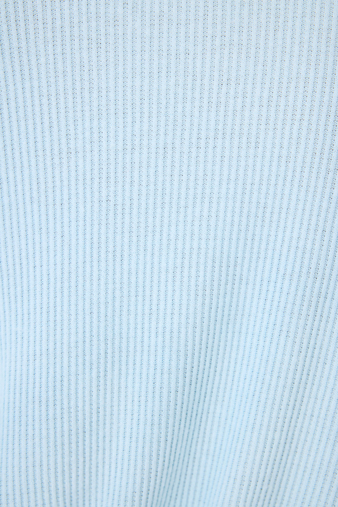 Close-up of the Textured Essentials Robe by P.J. Salvage, featuring a sky-blue cotton-blend jersey fabric with vertical ribbed texture and evenly spaced raised lines running parallel.