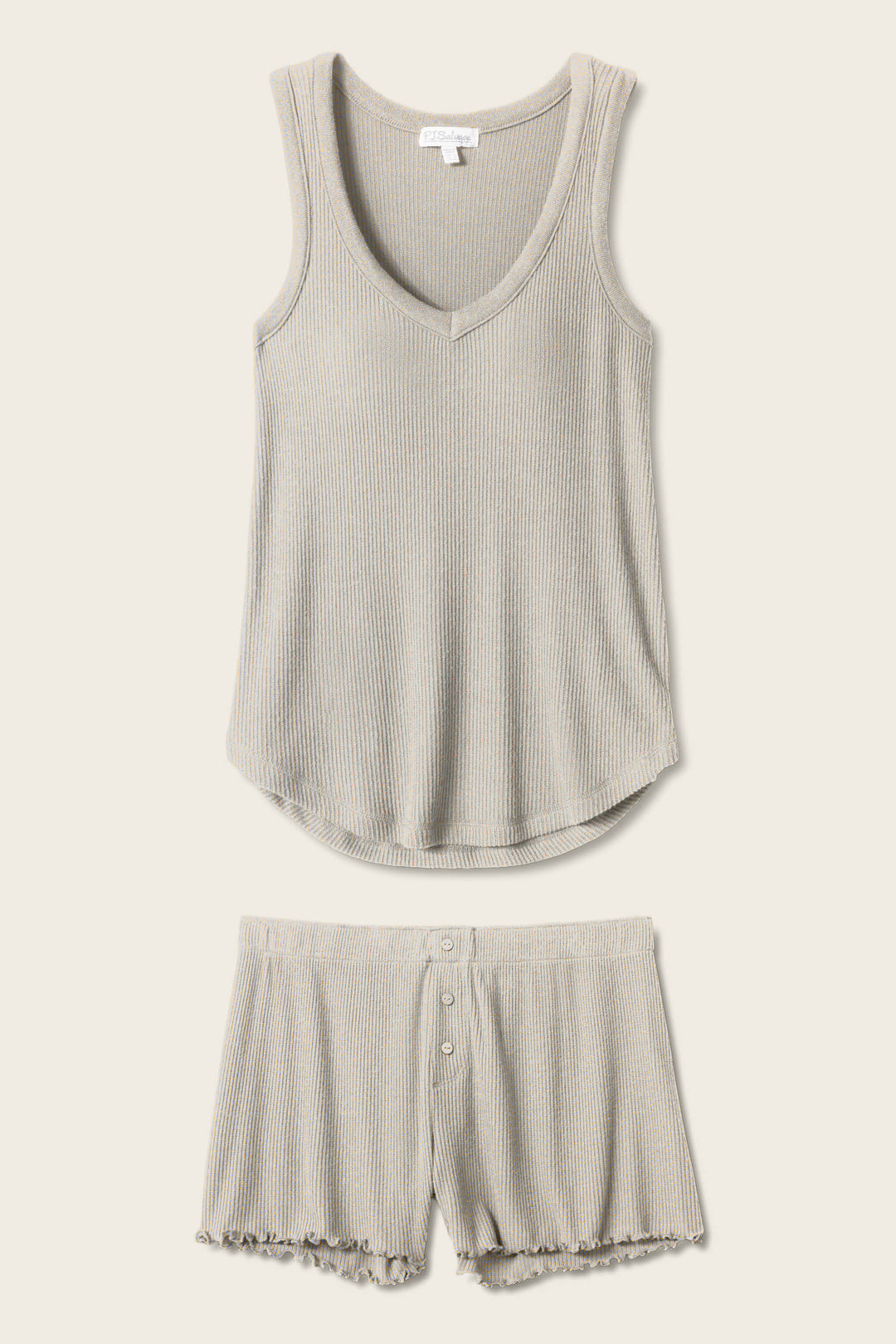 The P.J. Salvage Textured Essentials Heather Grey Short PJ Set features a light grey ribbed sleeveless V-neck tank and button-front shorts with ruffled hems, displayed flat on a neutral background.
