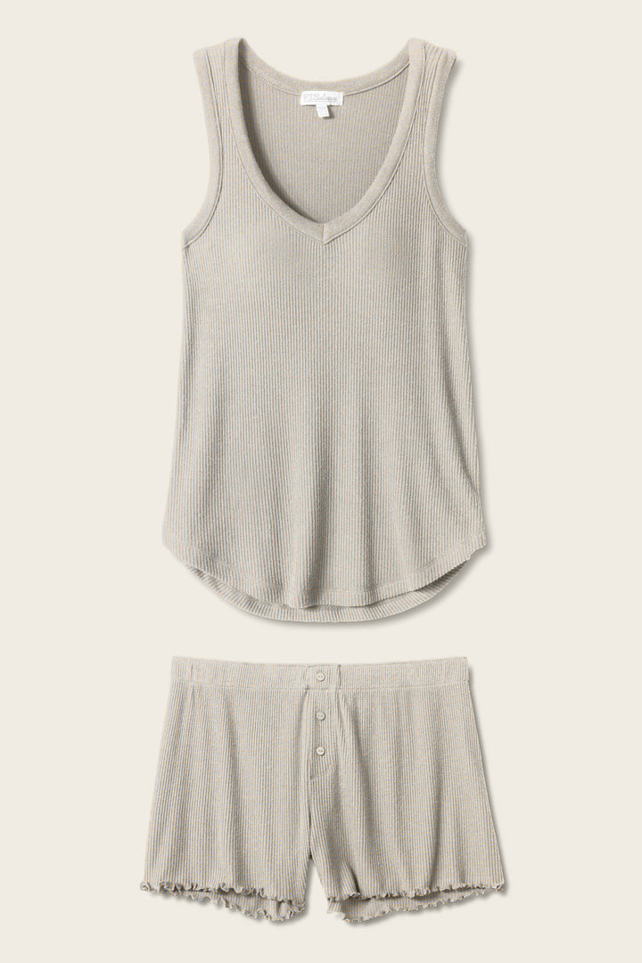 The P.J. Salvage Textured Essentials Heather Grey Short PJ Set features a light grey ribbed sleeveless V-neck tank and button-front shorts with ruffled hems, displayed flat on a neutral background.