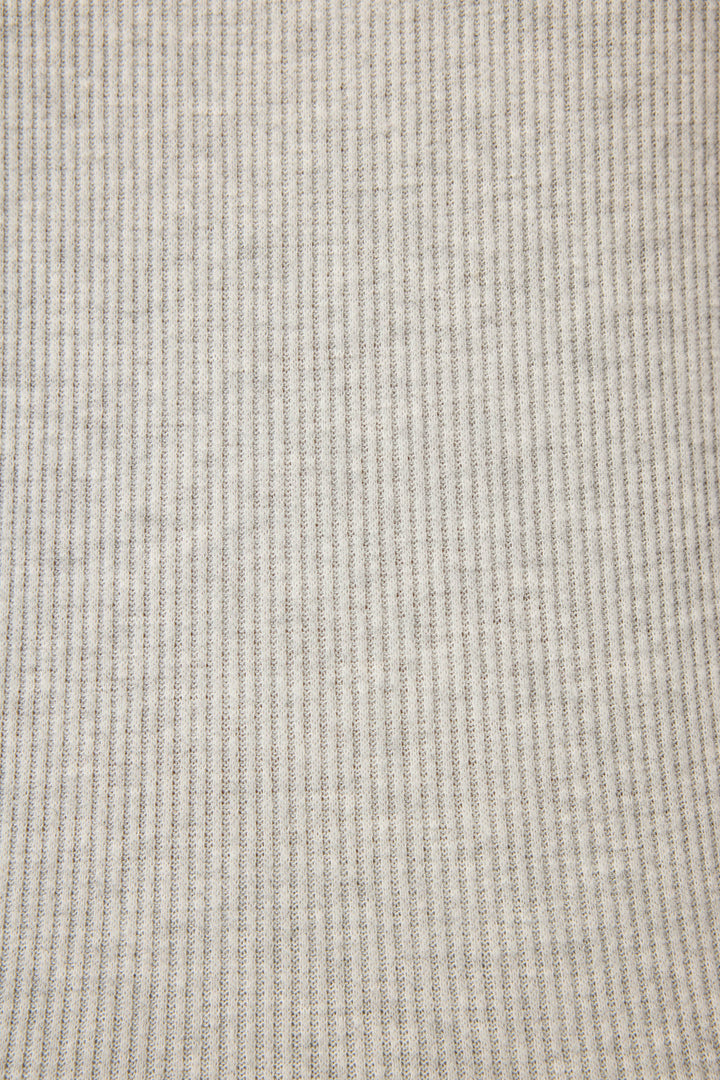 Close-up of the heather grey ribbed fabric from the P.J. Salvage Textured Essentials PJ Set, showing soft vertical stripes for a cozy feel—ideal for breathable, stylish sleepwear.
