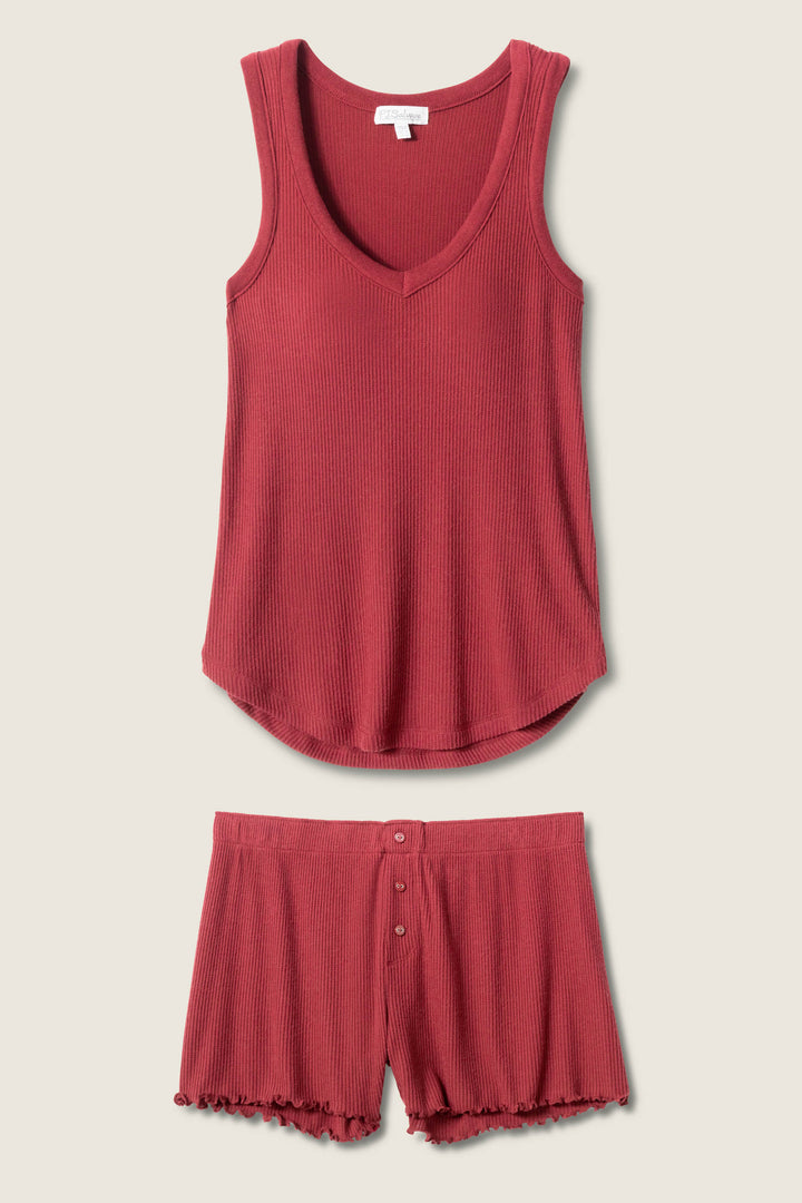 The P.J. Salvage Textured Essentials Short Set, featuring a sleeveless ribbed red V-neck tank and matching button-front shorts with ruffled hems, is displayed flat on a light background.