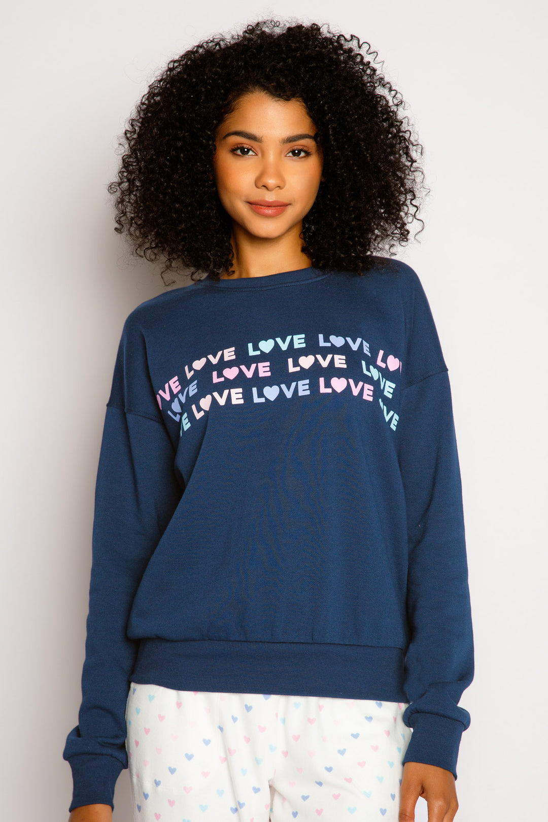 Navy high-pile fleece pullover top with LOVE letter repeat print on chest. (7325667688548)