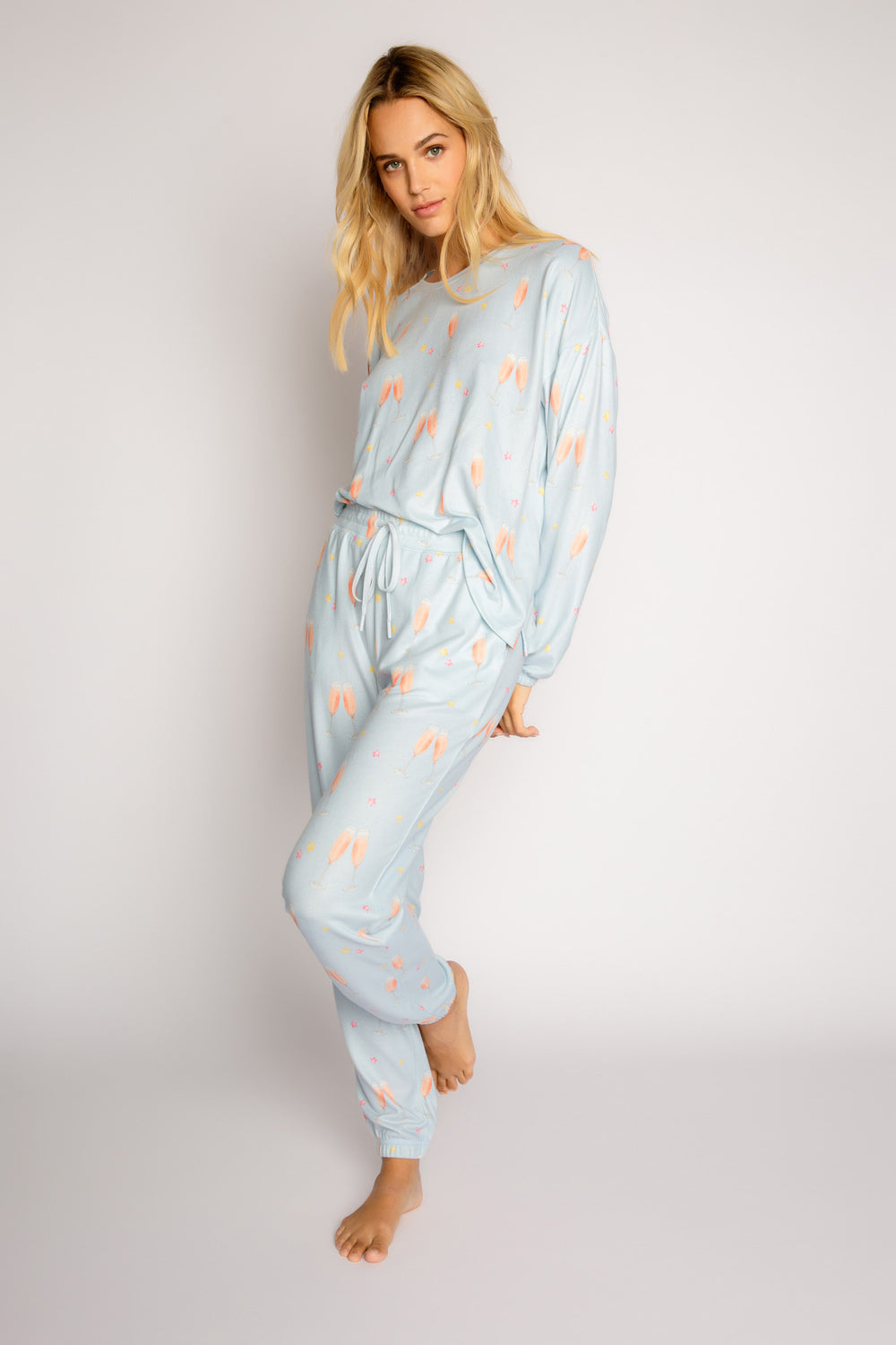 Pale blue sleep set in rose' wine printed butter jersey. Pullover top & jogger pant with pockets. (7325669851236)